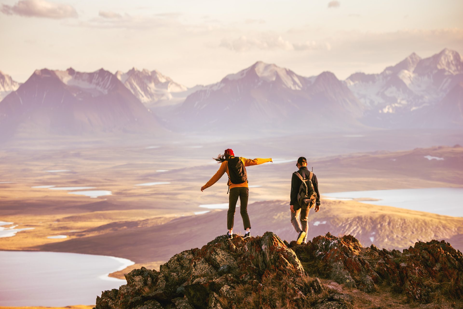 Hikers at the peak of mountain overlook